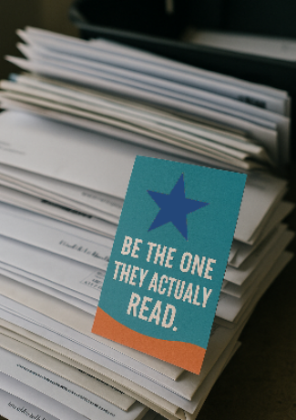 Direct mail postcard standing out from a stack of envelopes for targeted mail marketing in Roanoke Virginia