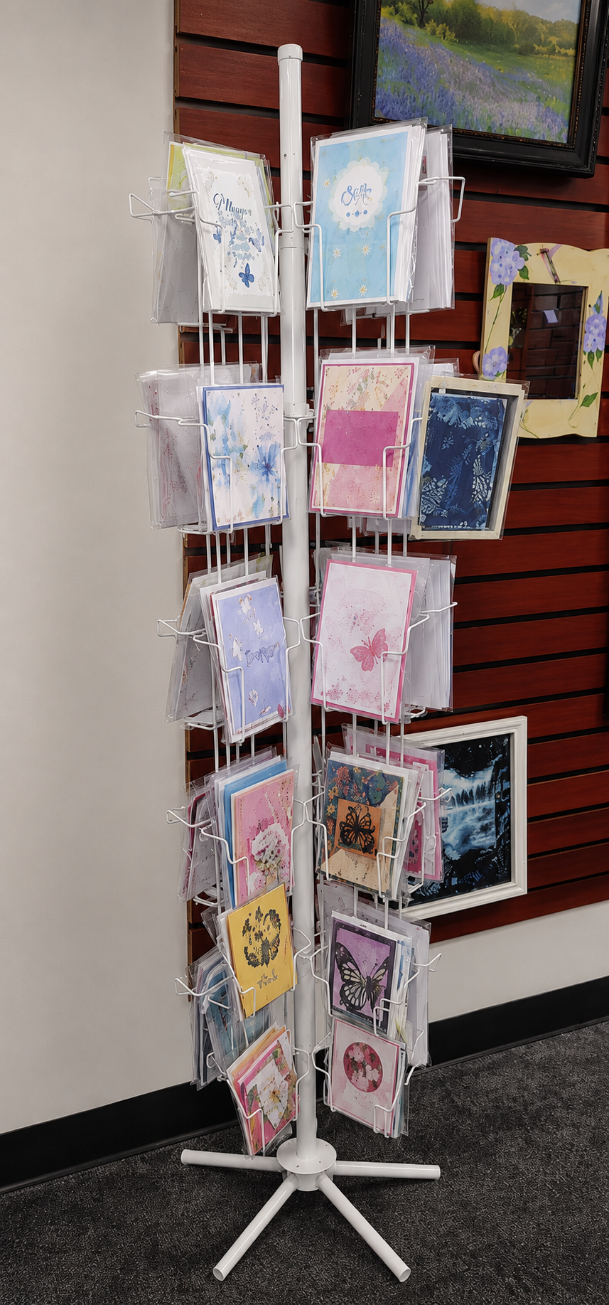 Rotating rack of handmade greeting cards from local artists at Star MailHub Print & Business Center in Roanoke, Virginia.